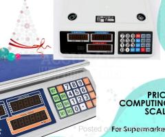 price computing scale with money change function at supplier shop Kampala