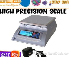 Laboratory precision balance with zero adjustment knob