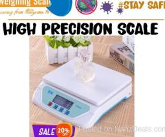 Laboratory precision balance with zero adjustment knob